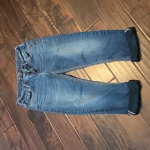 Women's silver suki style capris. Dark blue